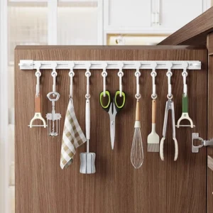 Multipurpose cabinet door slide hook